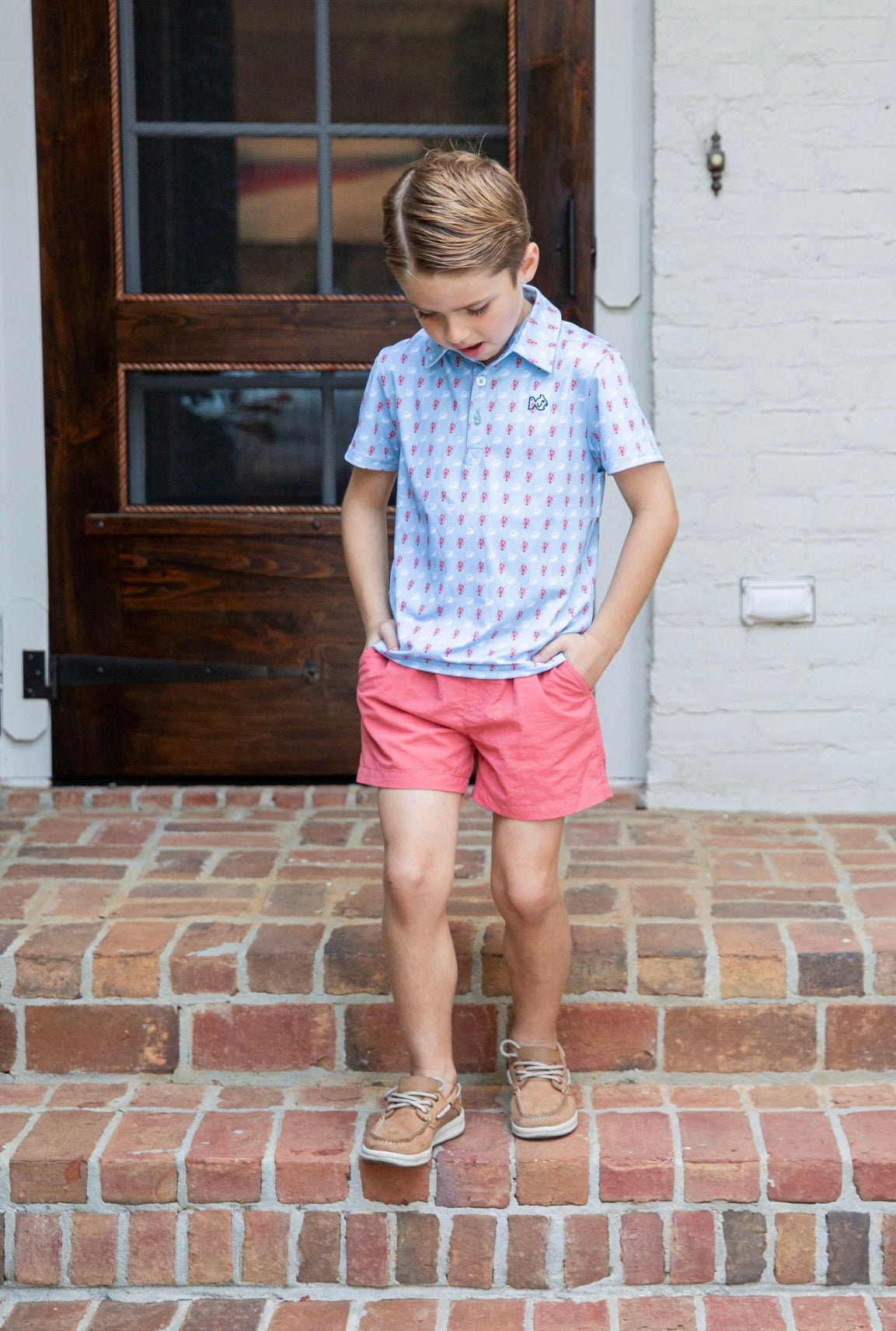Boys Outrigger Performance Short in Spiced Coral