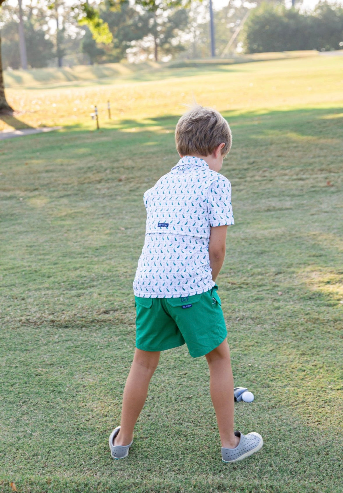 Boys Short Sleeve Pro Performance Polo in Golf Print on White