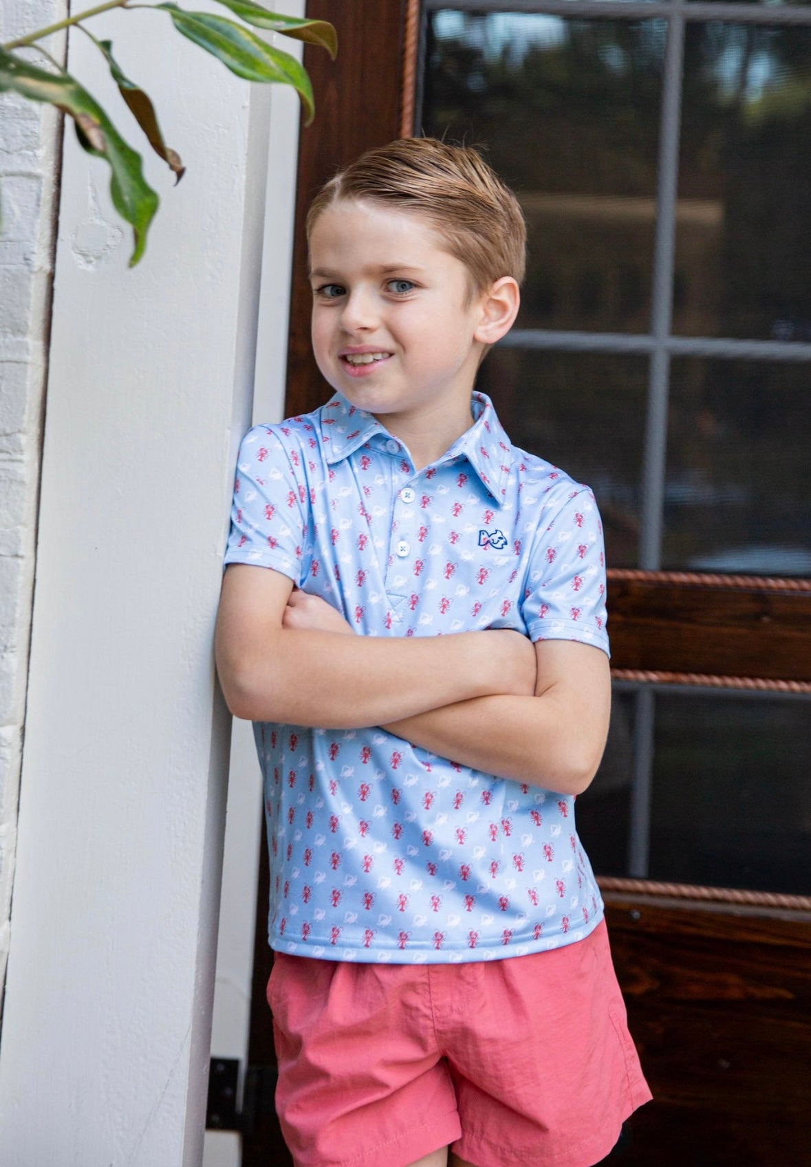 Boys Short Sleeve Pro Performance Polo in Crab and Lobster Print on Light Blue