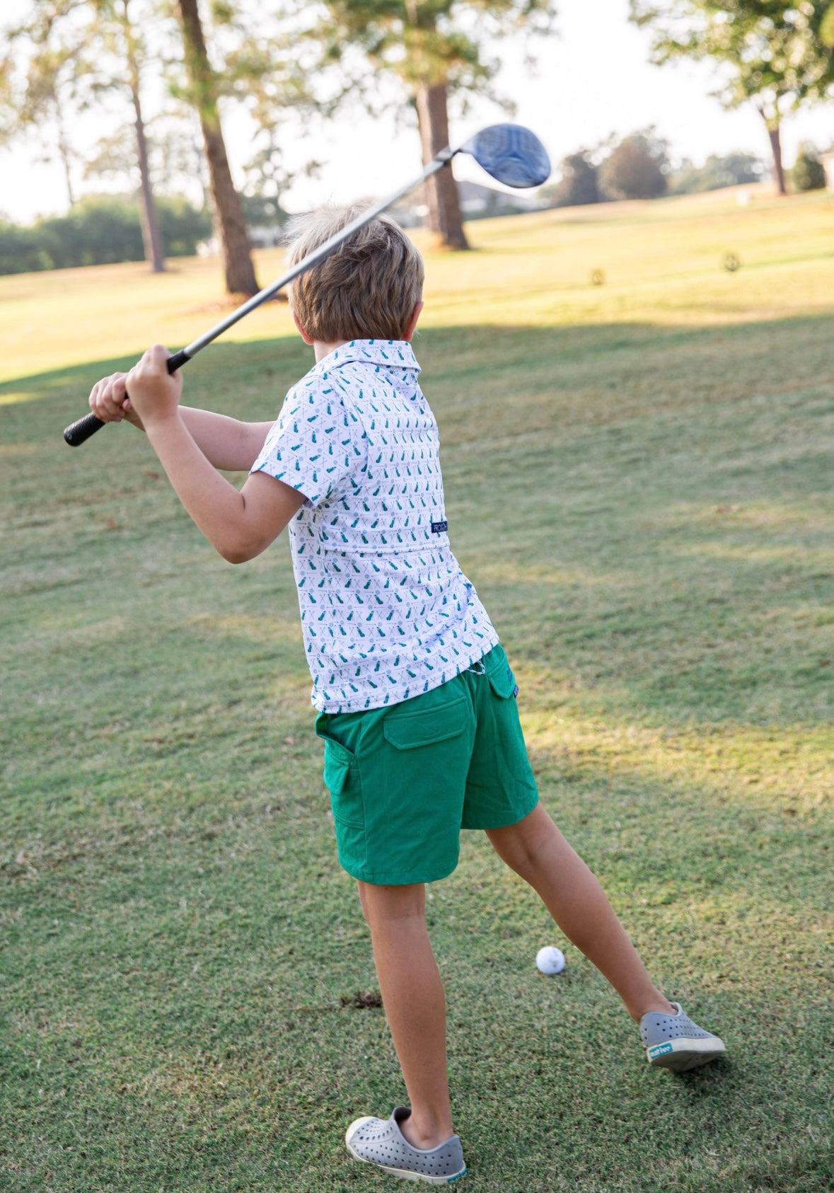Boys Short Sleeve Pro Performance Polo in Golf Print on White